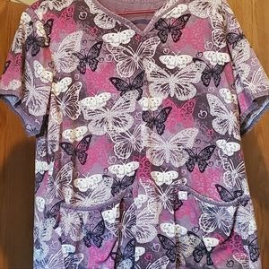 Scrub top. Purchased at Scrubs&Beyomd. Lighter weight material. Well loved